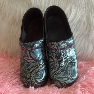 Dansko Iridescent Floral Pattern Clogs in Black and Silver